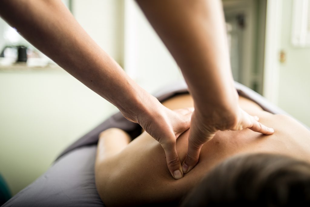 cheri's hands during a back massage