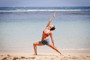 cheri neal yoga pose on the beach